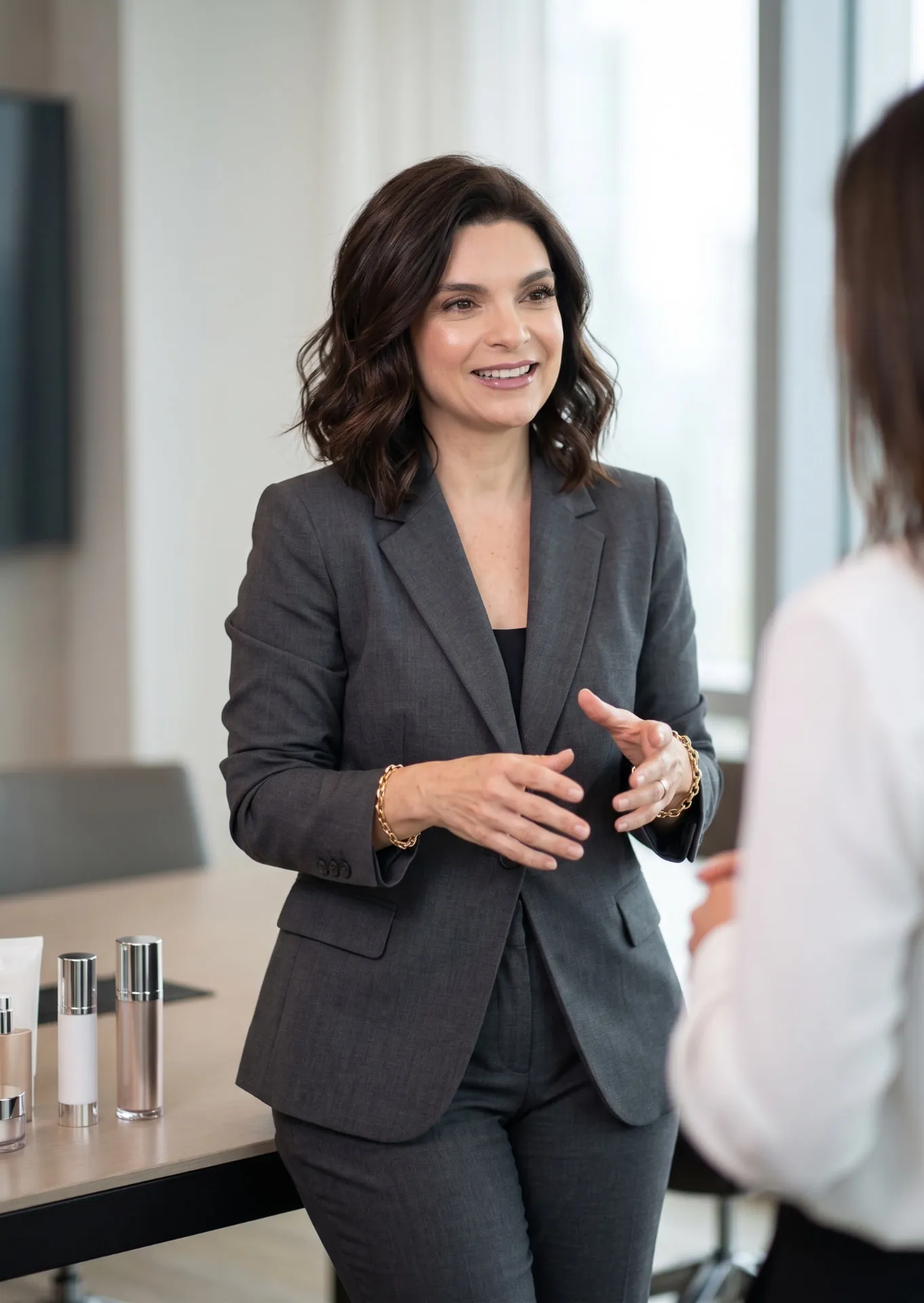 Emilie Valencia in conversation with beauty founders at a table